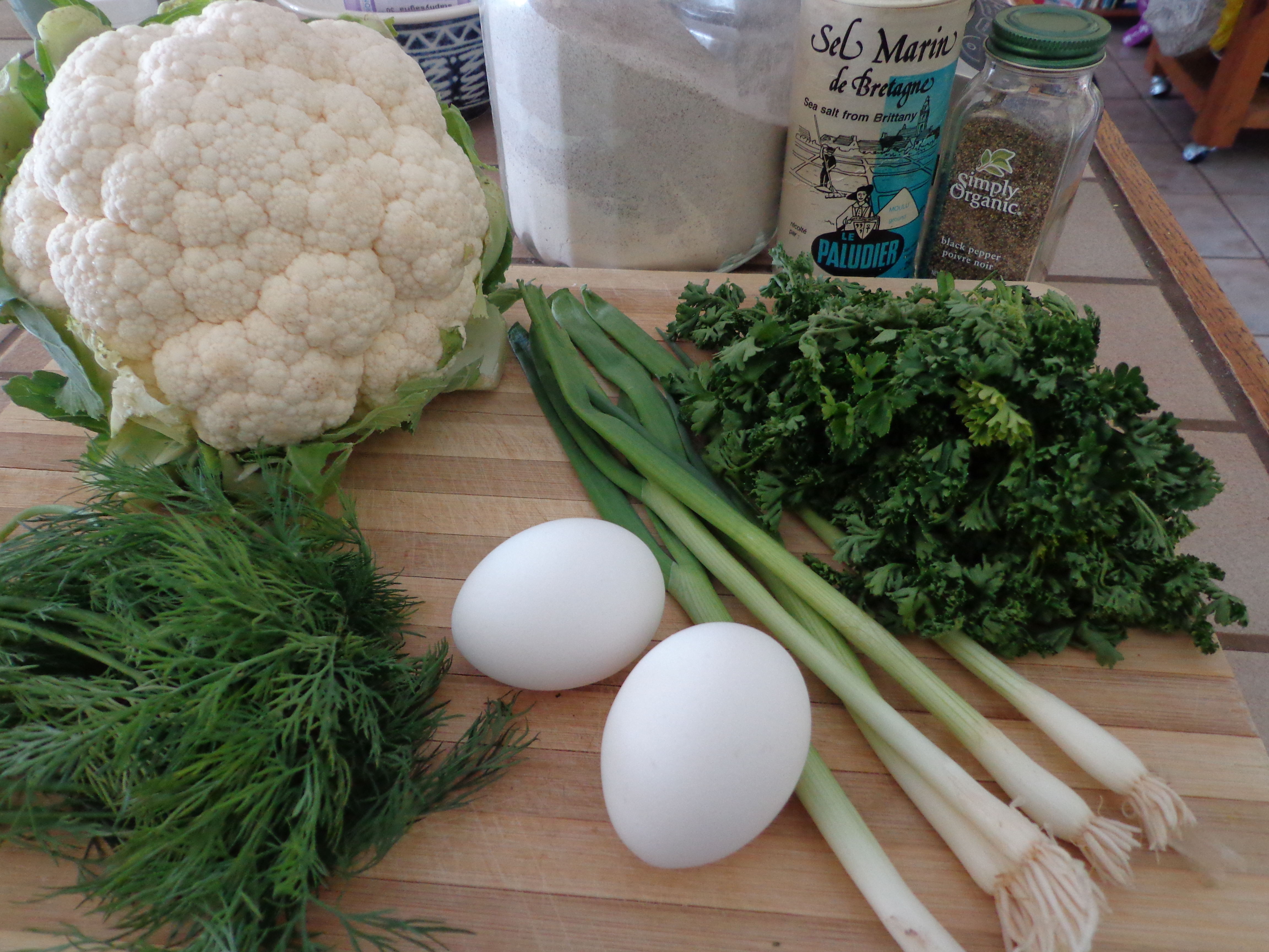 cauliflower, dill, eggs, green onion, parsley, flour, salt & pepper