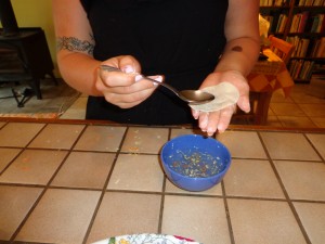 use the back of a spoon to wet the outer edge of dumpling wrapper